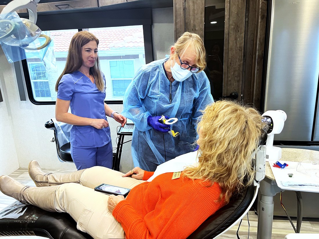 Consultation and screening on the Vera Dental Profiling Camps unit